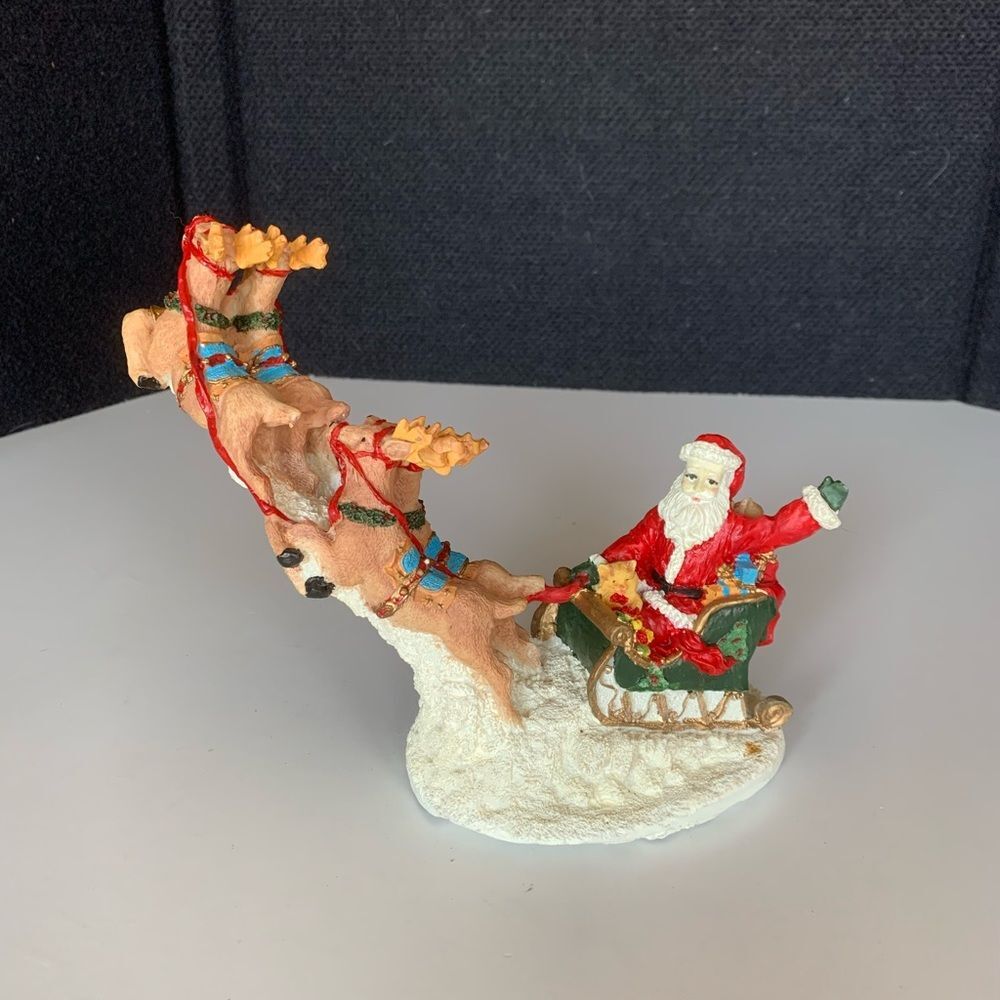 Christmas Reindeer poly resin figurine. Santa and his sleigh - with deer